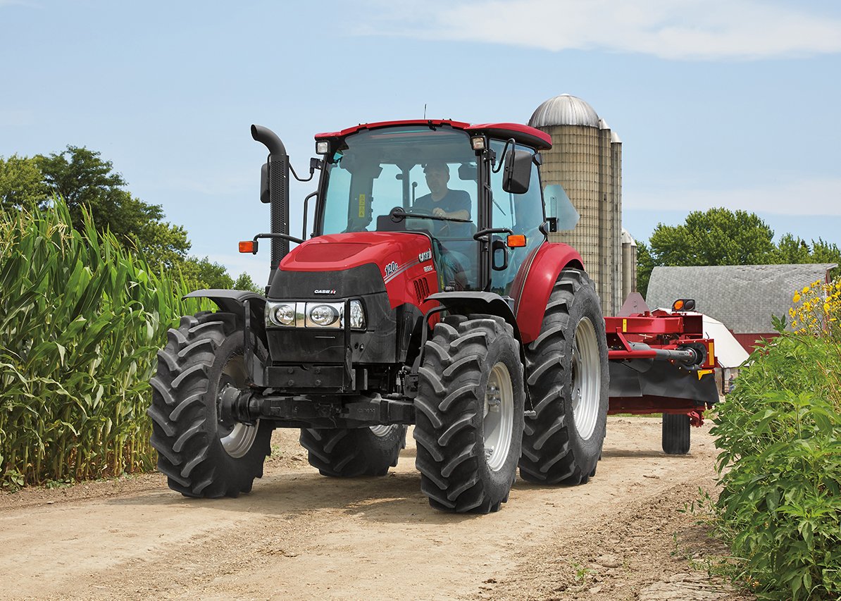 Case IH Farmall 120C utility tractor shown on the farm, built for loader work, mowing, and everyday chores for small and mid-size operations